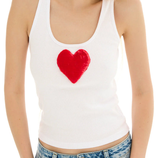 White tank top with a red heart design worn by a person on a white background