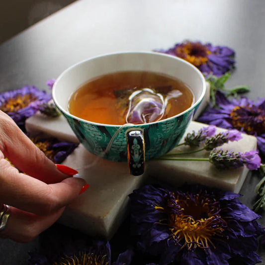 Teacup with flowers on a table
